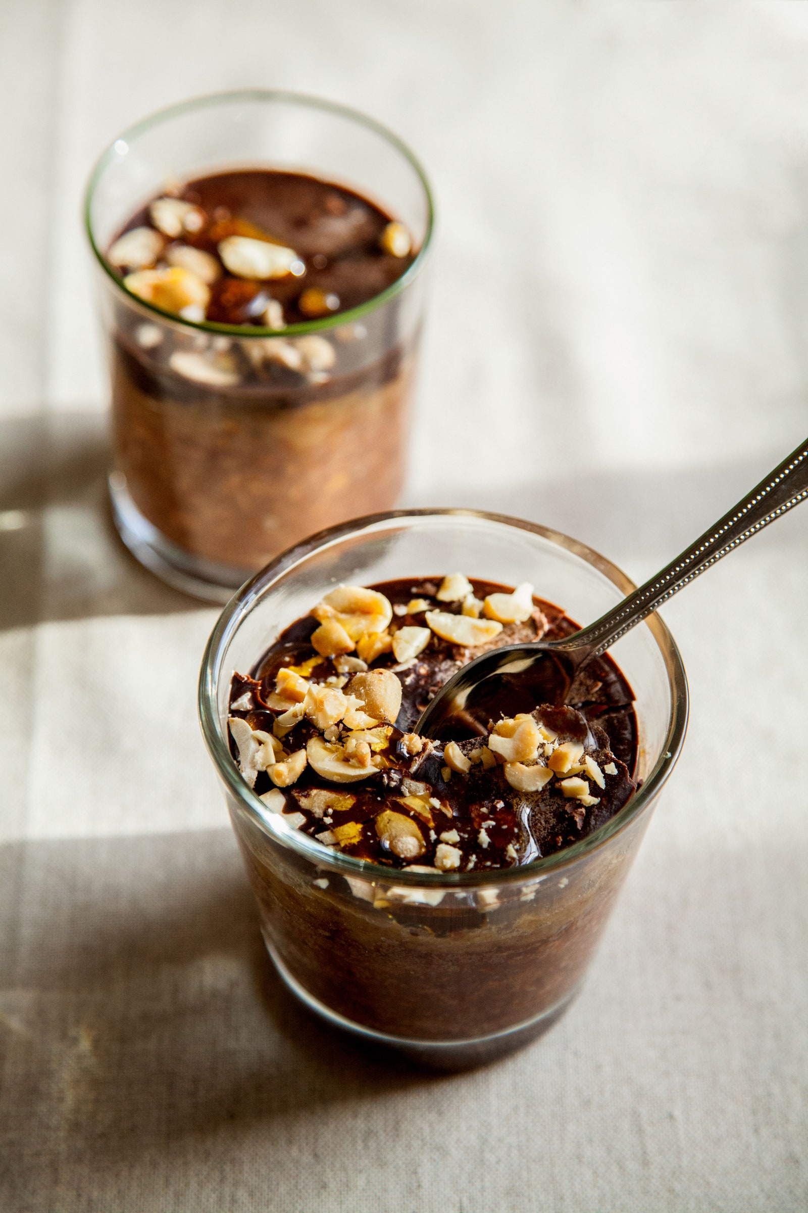 Snickersinspired overnight oats with date caramel and a chocolate shell