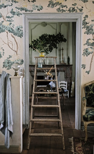 Louis XV style doors frame the entrance in to the sitting room.